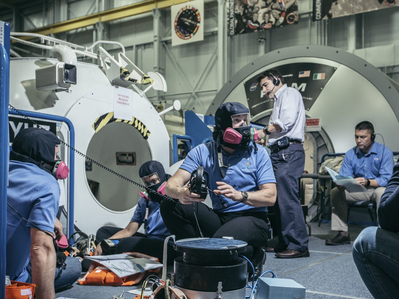 Alexander Gerst during a simulated ammonia leak in the ISS. NASA Johnson Space Center, Houston, Texas, USA, 2018