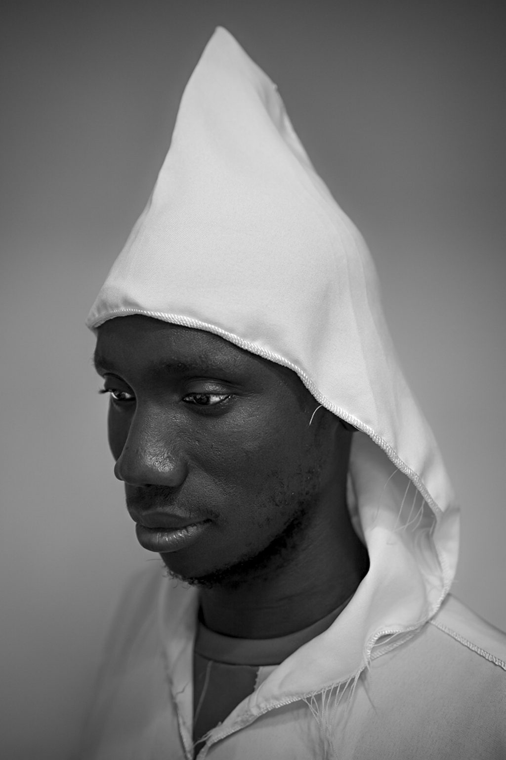 Portrait of Diop Osseynou, born in 1993 in Gambia. Reggio Emilia, Italy, 2019