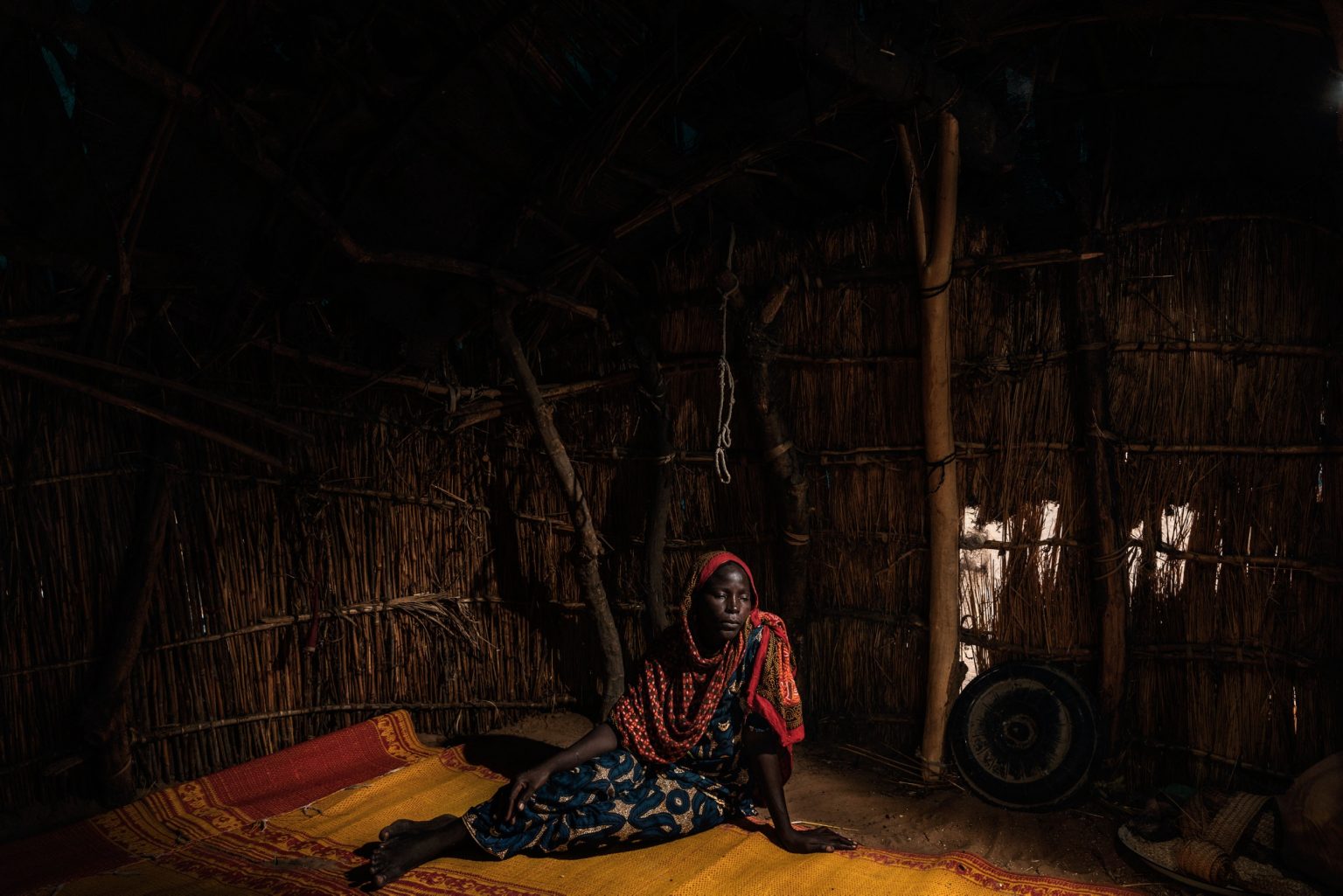 Africa, Chad, Melea, October 2018 - Babai Mahamat Kolita, aged 30, was kidnapped in 2014 by Boko Haram terrorists, with whom she was forced to live for a year with her children. During the kidnap operation, her husband Ababakar Mbomi, an anti-Jihadi activist, was injured with 11 rifle shots. ><
Africa, Ciad, Melea, Ottobre 2018 - Babai Mahamat Kolita, 30 anni, è stata sequestrata nel 2014 dal gruppo terroristico Boko Haram, con i quali è stata costretta a vivere per un anno con i suoi bambini. Durante il sequestro, il marito Ababakar Mbomi, attivista anti-Jihadista, è stato ferito da 11 colpi di fucile.*** SPECIAL   FEE   APPLIES *** *** Local Caption *** 01362889