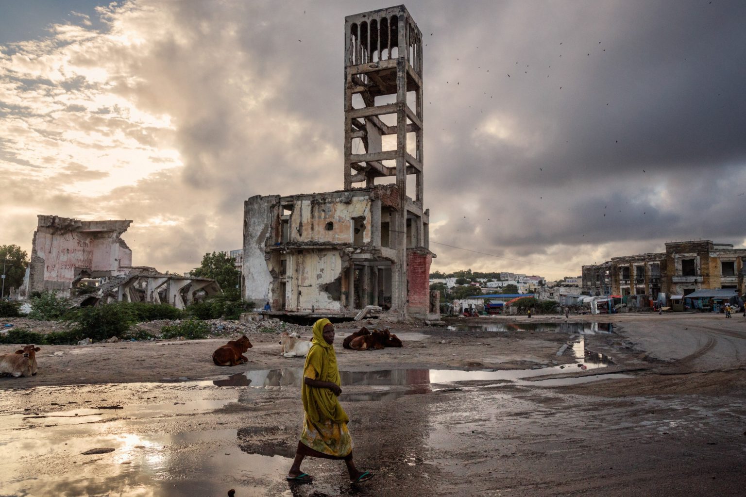Africa, Somalia, Mogadishu. 19/10/2015. A glimpse of the city: The destroyed structures of the old parliament in the Hamar Weyne district. The present of the Somali capital. Behind it, a civil war lasting 25 years; ahead of it, a future of rebirth. Mogadishu is at a crossroads. On the one side, the persistence of a surreptitious conflict based on a new, asymmetrical strategy of terror with Al-Shabaab, yet on the other, a desire for a return to normal life on the part of the Somali people, who are timidly seeking to carve out a role for themselves.