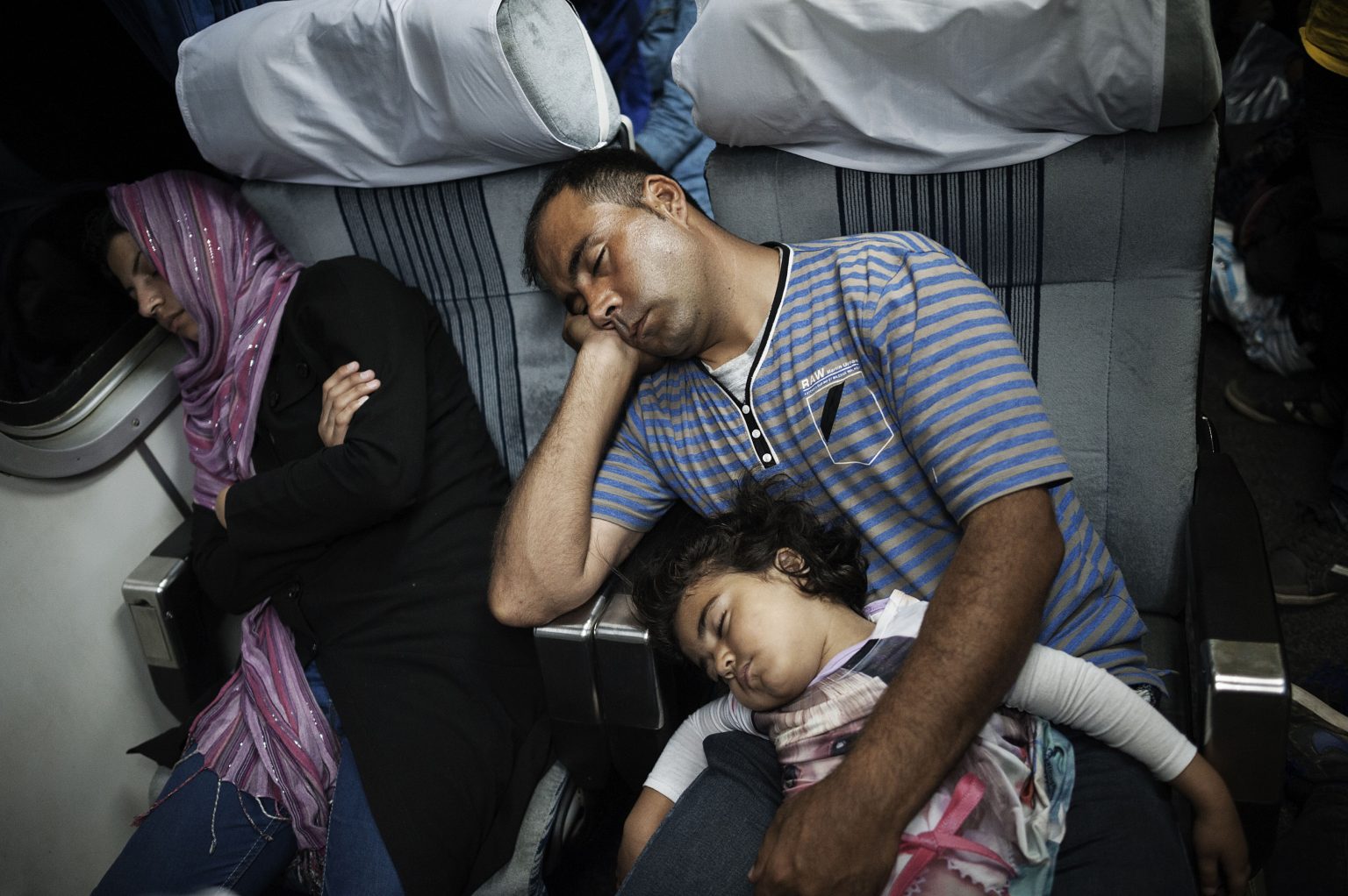 Novi Sad, July 2015 - Novi Sad, July 14 2015 - Afghan and Pakistani immigrants travelling on a train started from Belgrade railway station and proceeding towards the city of Subotica, arrival point of most of the refugees who want to cross the border between Serbia and Hungary.     
-----
Since the Greek border has been a place almost inaccessible to migratory flows, the Balkan route for migrants has become the new access road to Europe. But since March 2015, the Hungarian Government has been clamoring for an anti-immigration policy. In July 14th, 2015 Hungary has started building an anti-migrant fence on Serbian border.   
>< 
Novi Sad, Serbia, luglio 2015 - Immigrati afghani e pakistani viaggiano su un treno partito dalla stazione di Bwelgrado e diretto alla citt di Subotica, punto di arrivo della maggior parte dei profughi che vogliono attraversare il confine tra Serbia e Ungheria.
----- 
Da quando la frontiera greca  un posto quasi inaccessibile per i flussi migratori, la rotta balcanica  diventata per i migranti la nuova via di accesso all?Europa. Ma da marzo 2015 il governo ungherese sta spingendo per una politica di anti immigrazione. Il 14 giugno 2015 l?Ungheria ha iniziato a costruire un muro al confine con la Serbia per fermare i migranti che cercano di entrare illegalmente in territorio ungherese. *** Local Caption *** 00563924