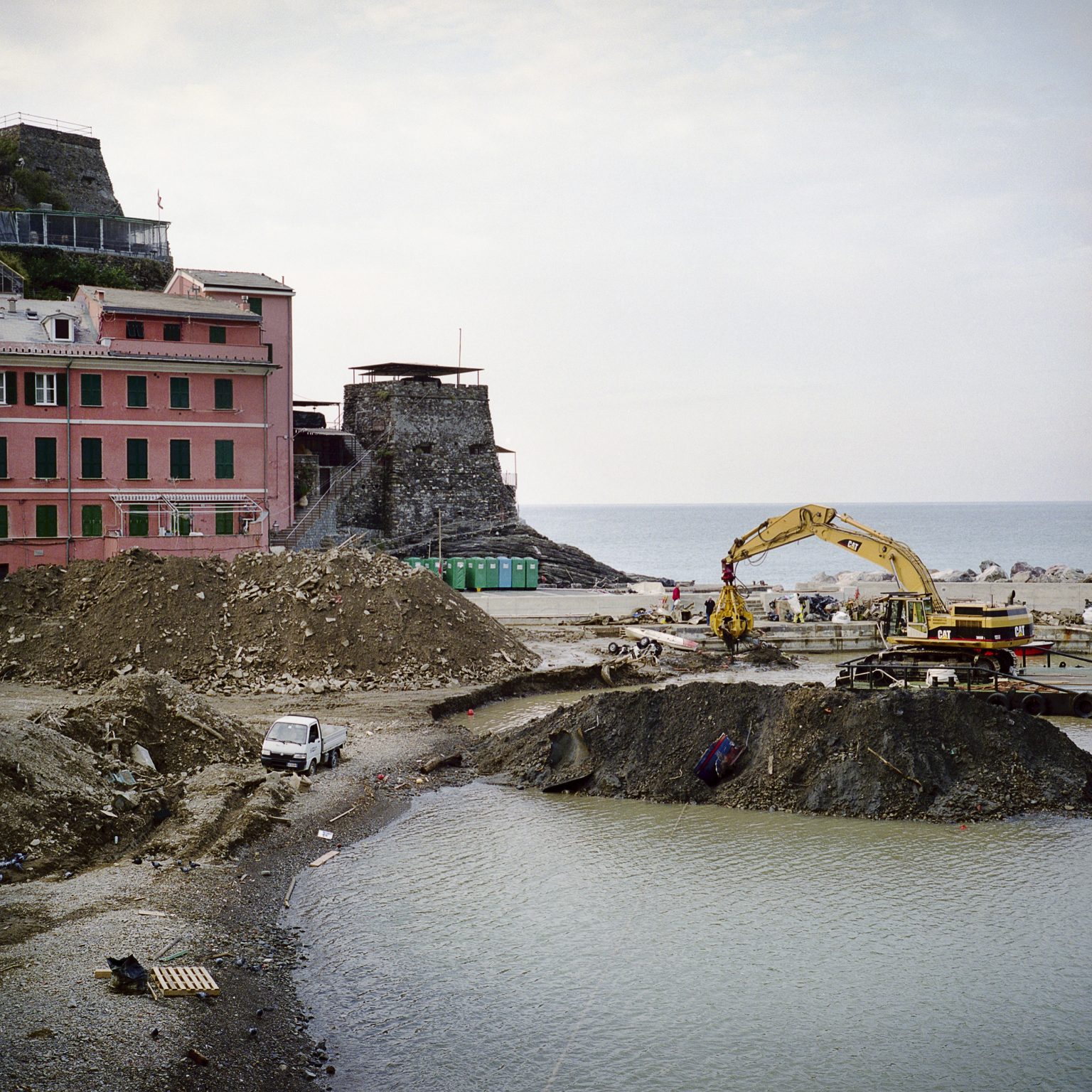 Vernazza, November 2011. After the intense rain the town was hit by a severe flood that caused much damage to the buildings and economic activities. On the seashore all the mud is taken after it was pulled out from streets and apartments.