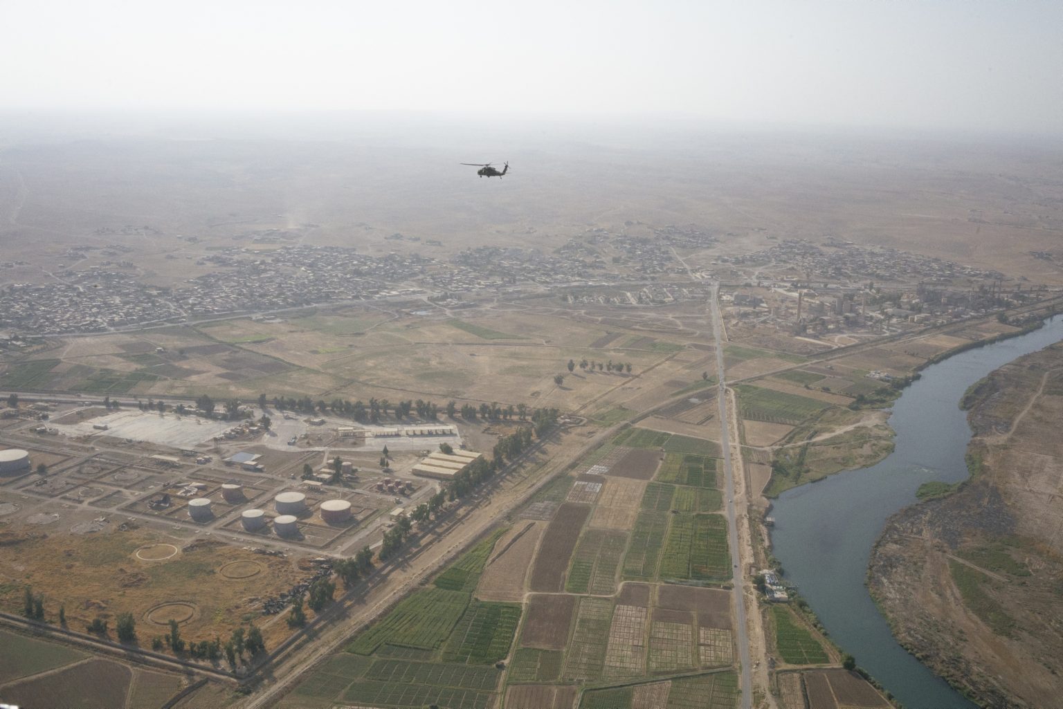 August 24, 2021 - The view from a CH-47 Chinook helicopter during a flight from Erbil Air Base to a remote U.S. Army combat outpost in northeastern Syria known as RLZ.