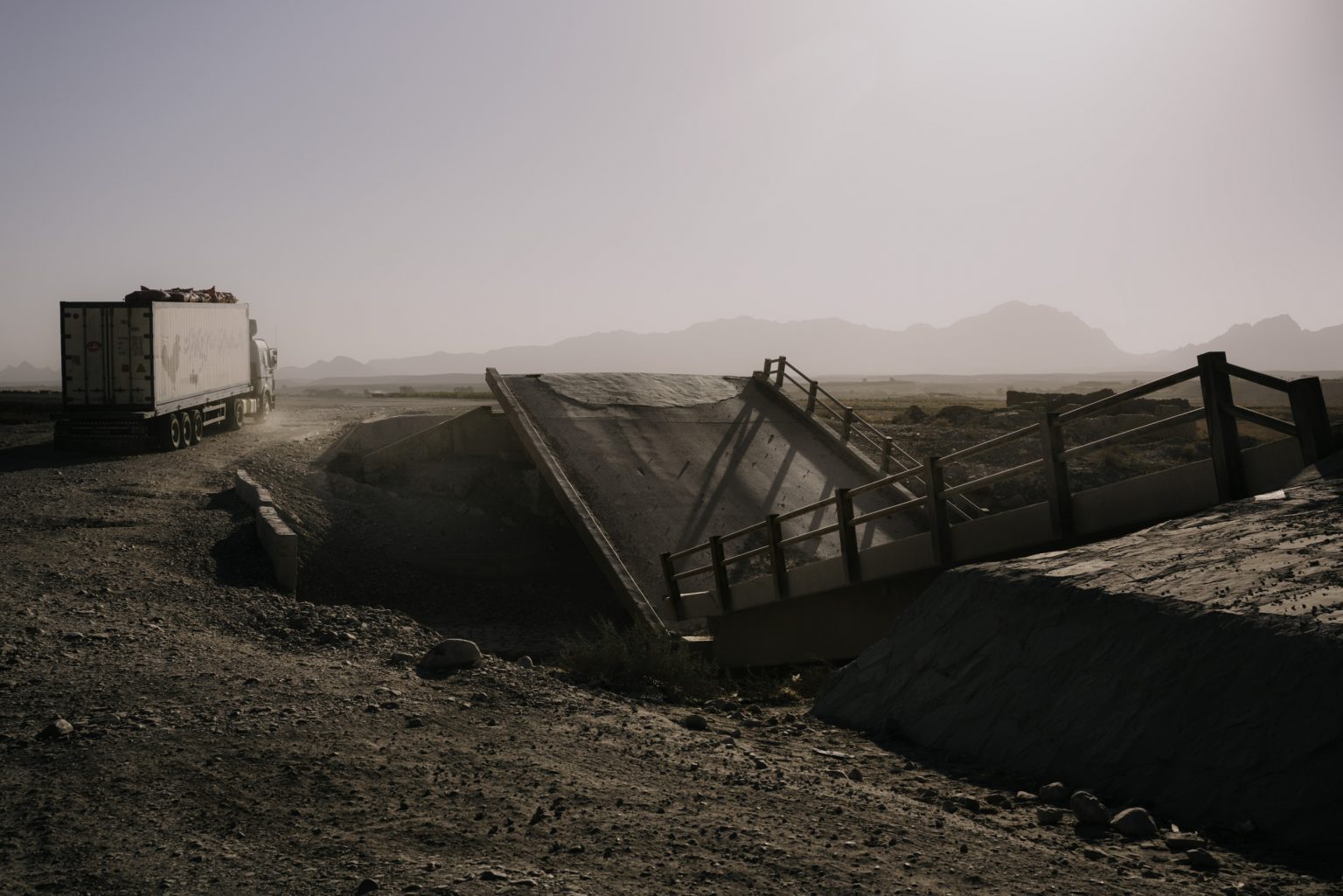 KANDAHAR, AFGHANISTAN - OCTOBER 20:
A destroyed bridge along highway near Kandahar is a reminder of the enormous cost of rebuilding Afghanistan after two decades of war.   
(Photo by Lorenzo Tugnoli/ The Washington Post)