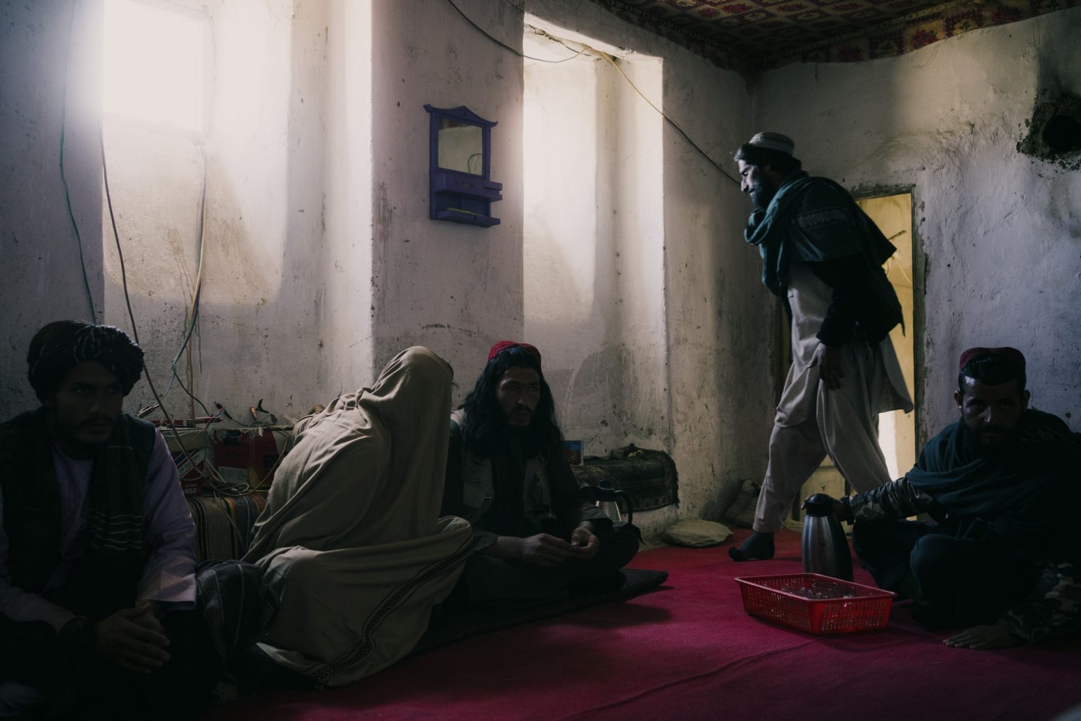WARDAK, AFGHANISTAN - OCTOBER 14:
A group of Taliban militant gather in what used to be their hide out in the village of Andar. They used to stage attacks and plant IEDs along the stretch of Highway 1 near the village.
(Photo by Lorenzo Tugnoli/ The Washington Post)