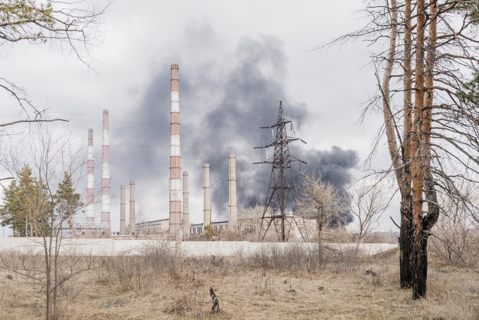 01563839 UKRAINE, Schastia. February 22, 2022 - Smoke rises from the power plant during hevy shelling in Schastia. *** Local Caption *** 01563839