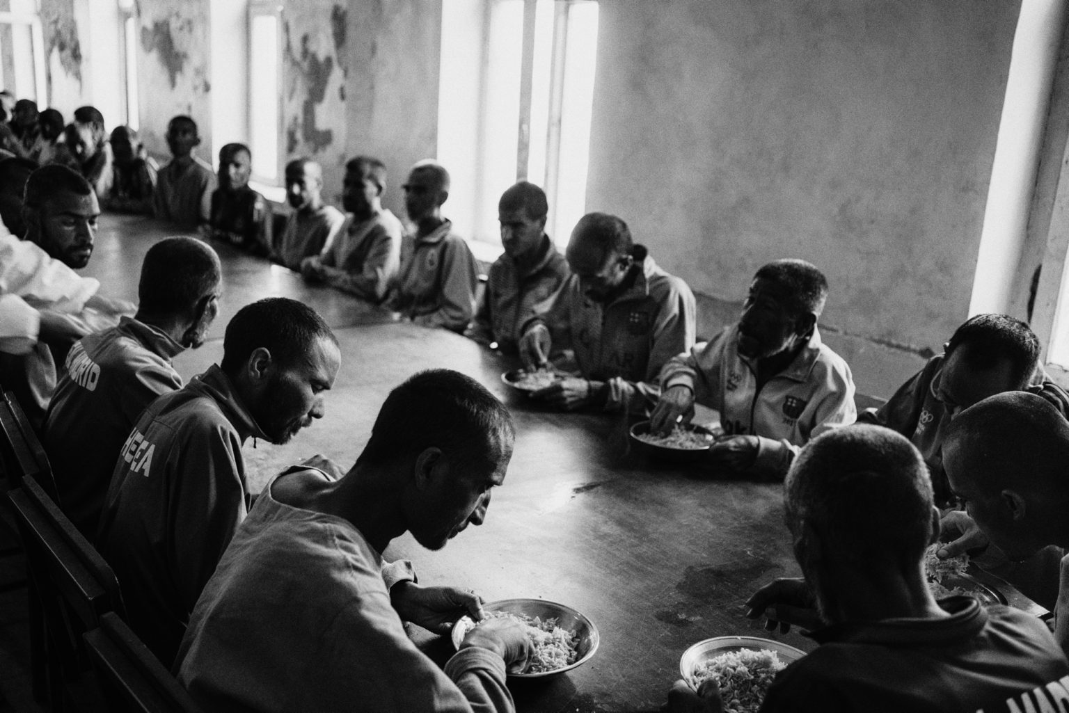 KABUL, AFGHANISTAN - MARCH 24, 2022:
Patients of the rehabilitation center for drug addicts sits together for lunch.
(Photo by Lorenzo Tugnoli/ Washington Post/ Contrasto)