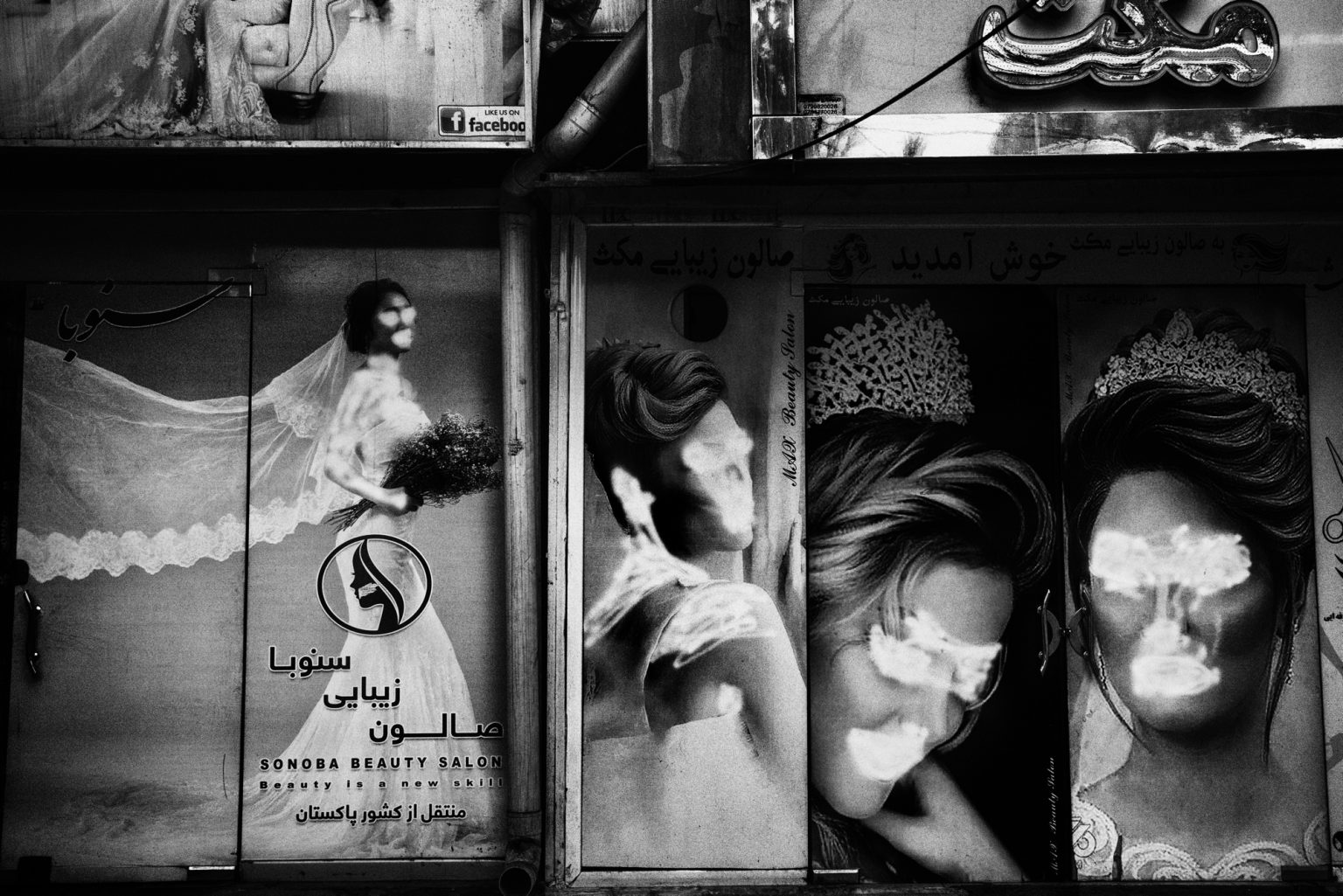 KABUL, AFGHANISTAN - SEPTEMBER 20, 2021:
Images of women have been painted over outside many beauty parlours. Even if the Taliban have not ordered to delete images of women the owners of the shops often have painted over the images in fear that the Taliban might damage the shop.
(Photo by Lorenzo Tugnoli/ Washington Post/ Contrasto)