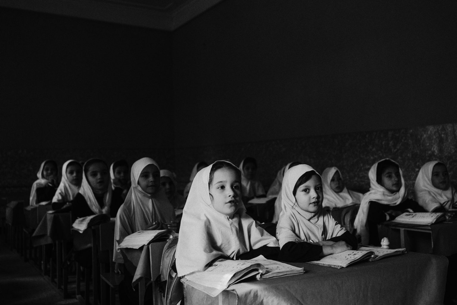 KABUL, AFGHANISTAN - SEPTEMBER 22, 2021:
Young students attend a lesson in Malalai high school for girls in central Kabul. 
Female students have been prevented to attend classes after grade 6 in some schools after the Taliban took over the country. 
(Photo by Lorenzo Tugnoli/ Washington Post/ Contrasto)