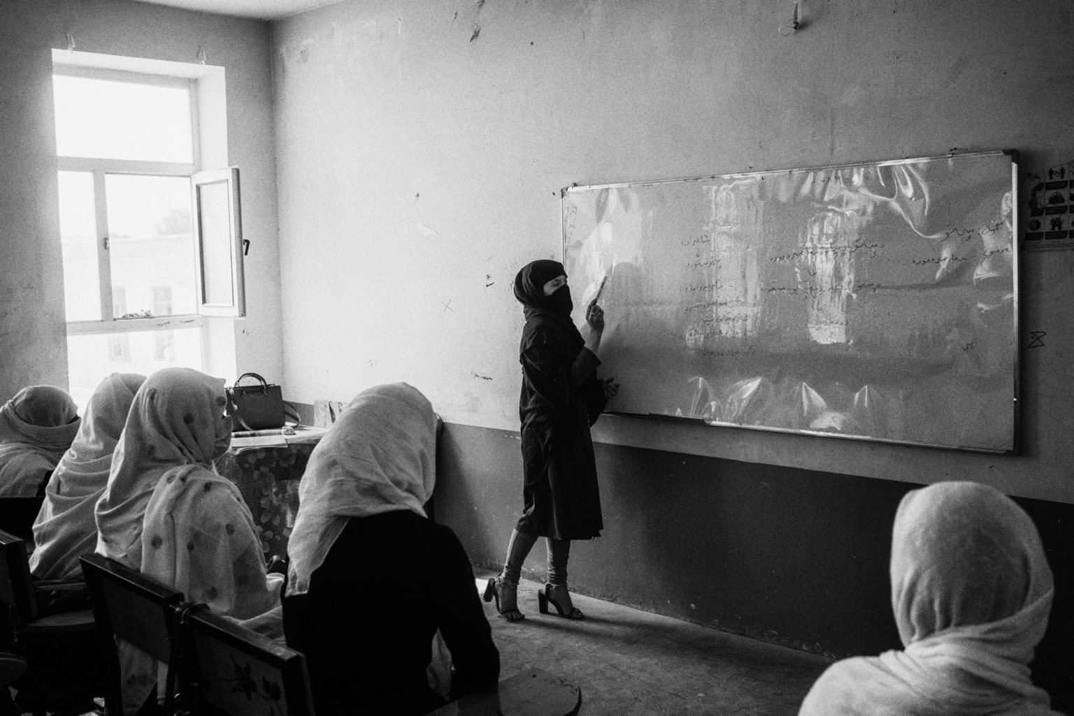 ZABUL, AFGHANISTAN - OCTOBER 20:
Girls above 6th grade are attending classes at Bibi Khala girls high school. In Kabul and most other parts of the county, the Taliban has forbidden girls older than 12 years old from attending.
(Photo by Lorenzo Tugnoli/ Washington Post/ Contrasto)