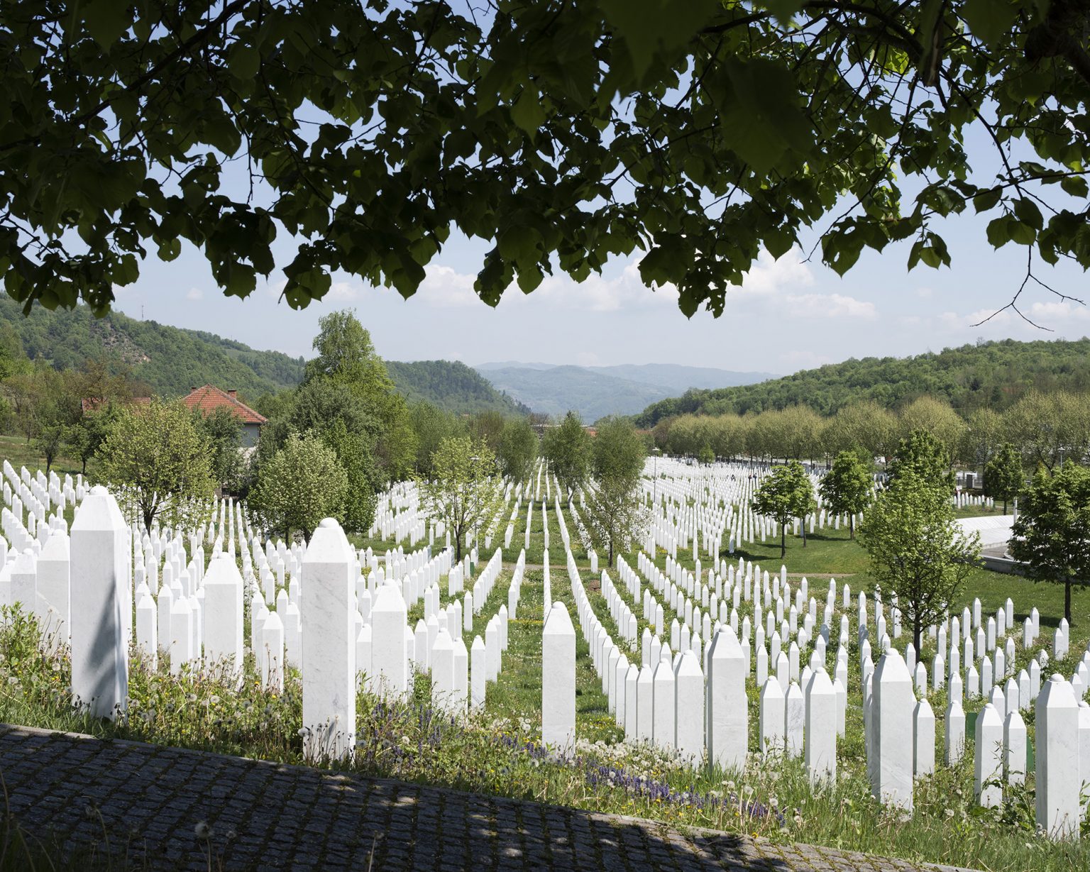 Potocari (Srebrenica), Bosnia Herzegovina, 2019.
The burial site containing the remains of the people killed in July 1995 during the fall of the Srebrenica Safe Area. More than 7.000 persons are buried here.