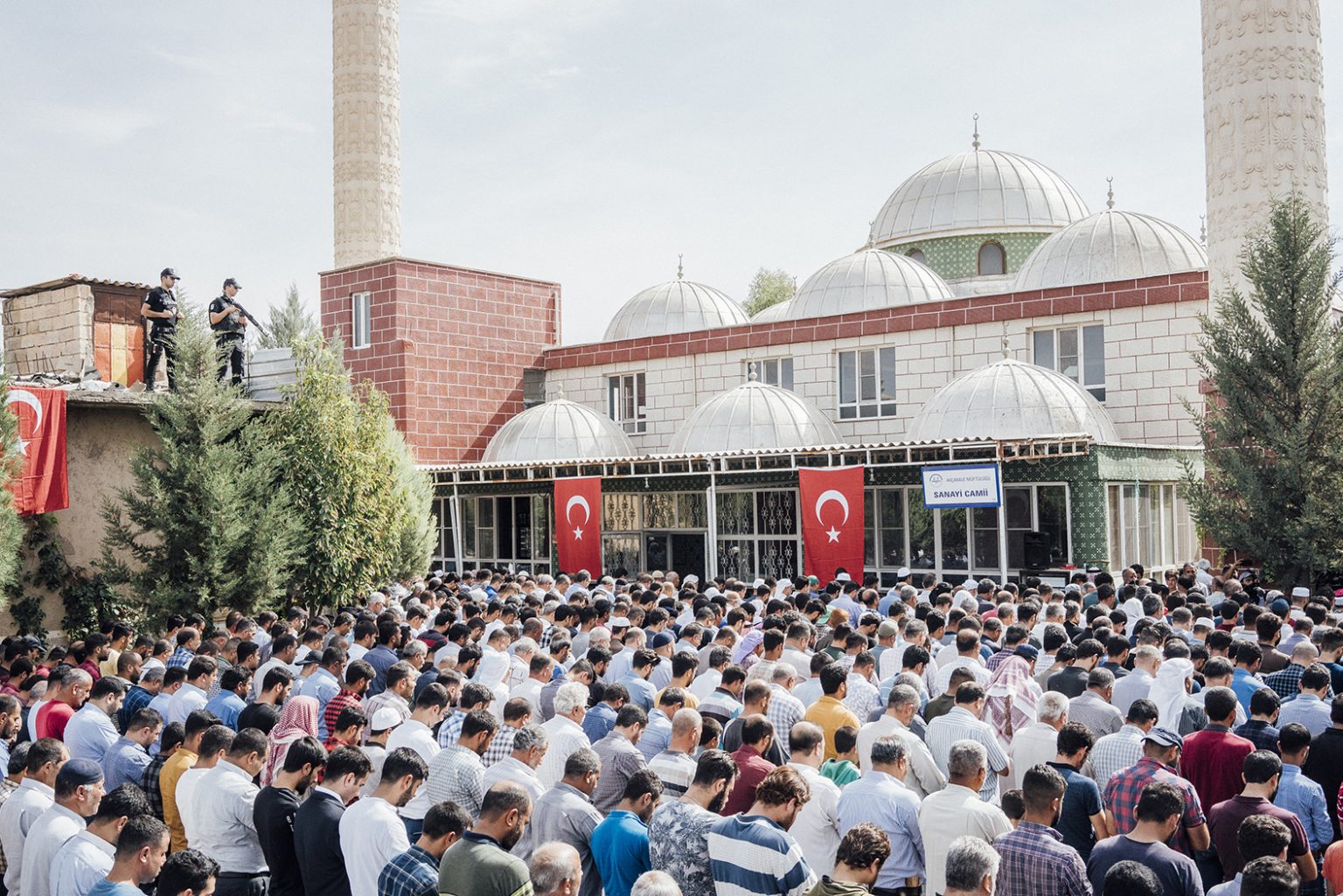 TURKEY. Akcakale. 11 October, 2019 - People on the courtyard of a mosque in Akcakale during the funeral of Mohammed Omar, a 9 months Syrian baby who was killed in rocket and mortar attacks in Akcakale.TURCHIA. Akcakale. 11 October, 2019 - Civili nel cortile di una moschea ad Akcakale durante i funerali di Mohammed Omar, un bambino siriano di 9 mesi ucciso durante gli attacchi nella cittài di Akcakale.
