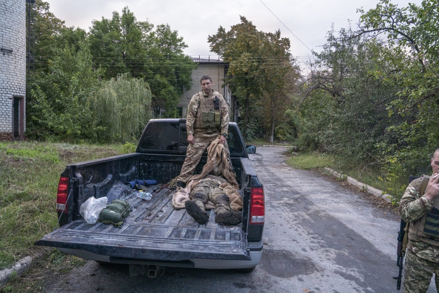 UKRAINE, Barvinkove.  September 17, 2022 - The dead body of Ivan Shpylyevoi, nom de guerre Sadist", is transferred to the morgue of the Barvinkove hospital. He died from an internal bleeding after being injured from the blast of an anti-personnel mine, south of Sulyhivka village.