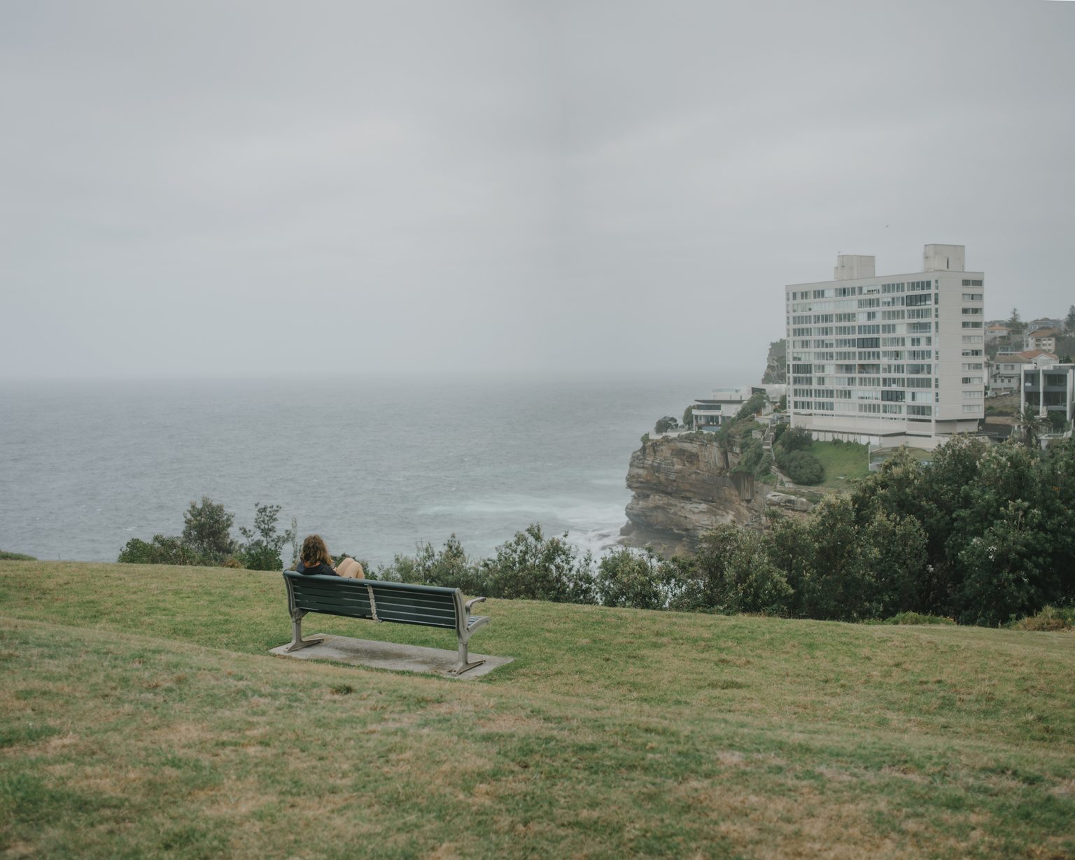 teenager-on-a-bench-along-the-sydney-coastal-walk-sydney-australia-2020